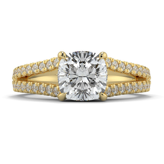 Gold ring with a large diamond and smaller diamonds on the band against a white background Yb jewellers engagement ring split band