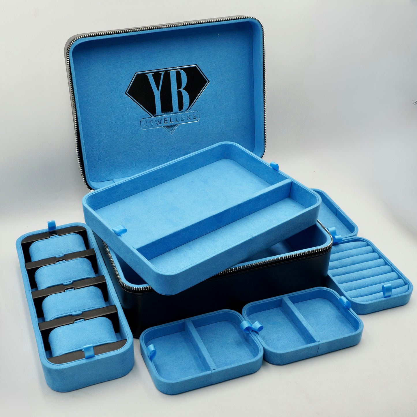Blue storage case with multiple compartments on a white background