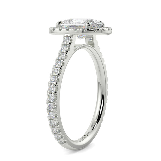 Diamond ring with a central gemstone and smaller diamonds on a white  YB Jewellers engagement ring best value background