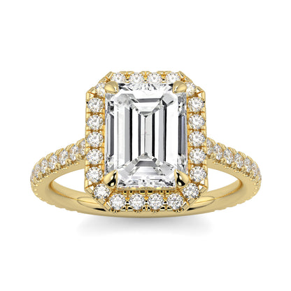 Gold ring with emerald-cut diamond and smaller diamonds on a white YB_Jewellers_Engagement_Ringbackground