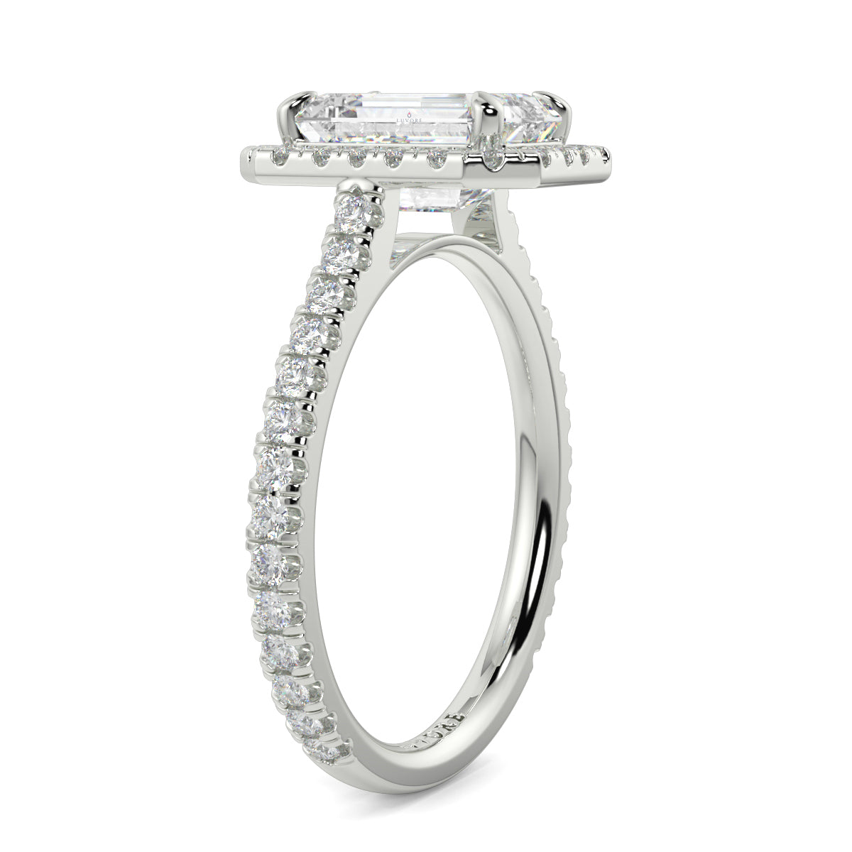 Diamond ring with a rectangular center stone on a white background YB_Jewellers_Engagement_Ring