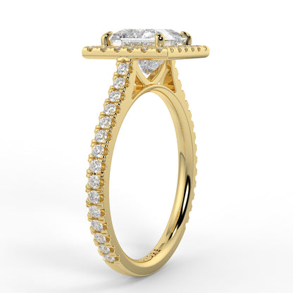 Gold ring with diamond accents on a white background yb jewellers engagement ring princess cut diamond ring tiger claws