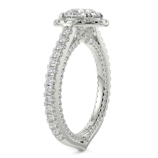 Diamond ring with a white gold band on a white background round diamond halo engagement ring yb jewellers tiger claws vintage style