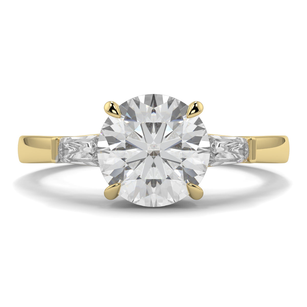 Gold ring with a large diamyb_jewellers_3_stone_trilogy_engagement_ring_round_and_pear_shape_best_selling_design_trending_diamond_ringond on a white background 