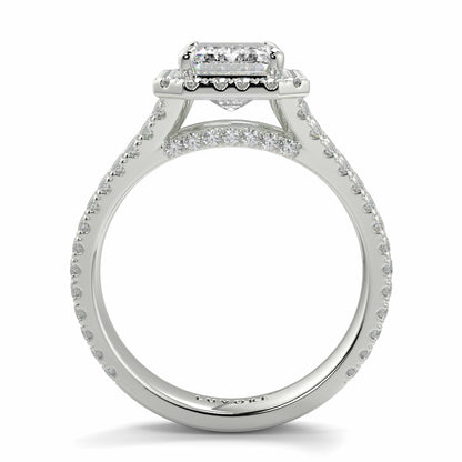 Silver ring with diamond accents on a white background Yb jewellers emerald split halo diamond engagement ring 