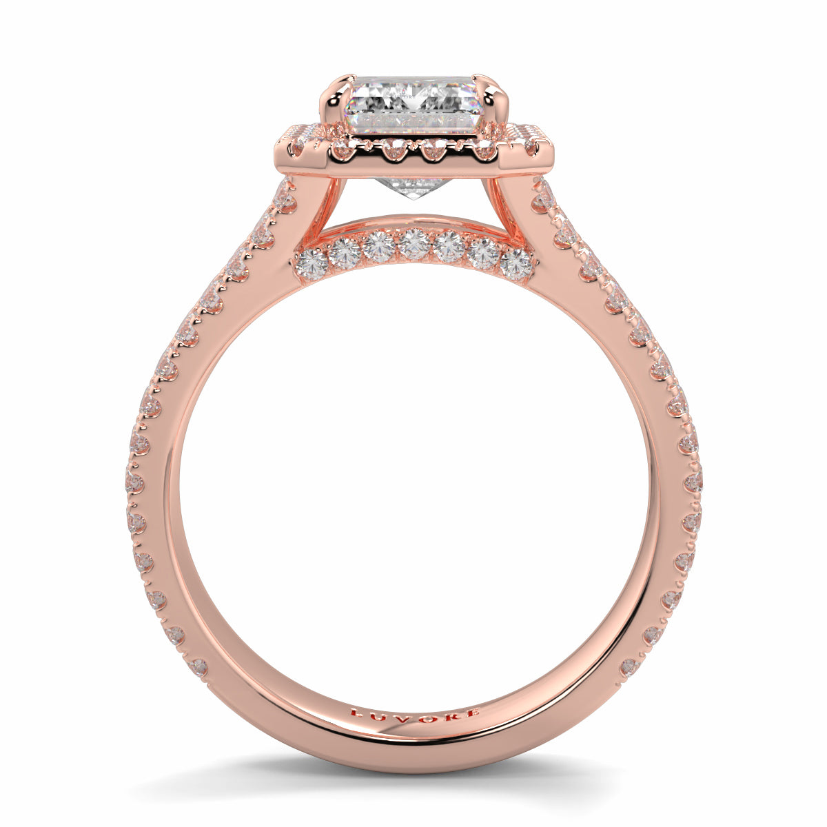 Rose gold ring with diamond accents on a white background Yb jewellers emerald split halo diamond engagement ring 
