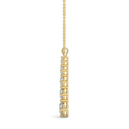 Gold necklace with a vertical diamond pendant on a white background