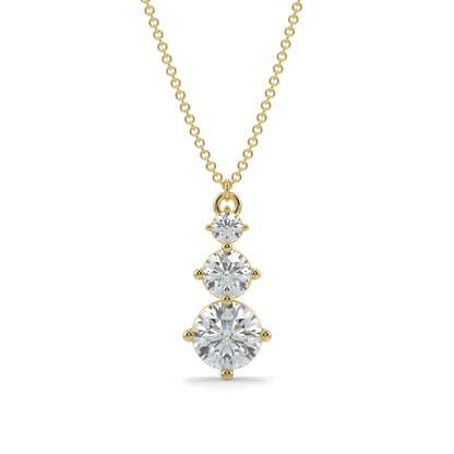 Gold necklace with three diamond pendants on a white background