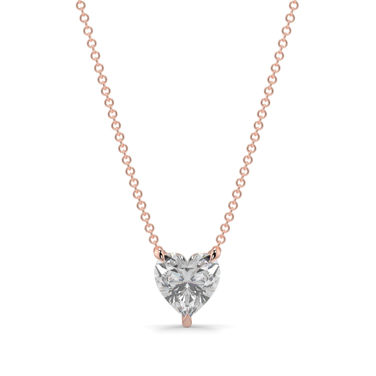 Heart-shaped diamond pendant on a rose gold chain against a white background Heart-shaped diamond pendant necklace yb jewellers