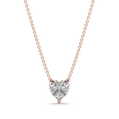 Heart-shaped diamond pendant on a rose gold chain against a white background Heart-shaped diamond pendant necklace yb jewellers