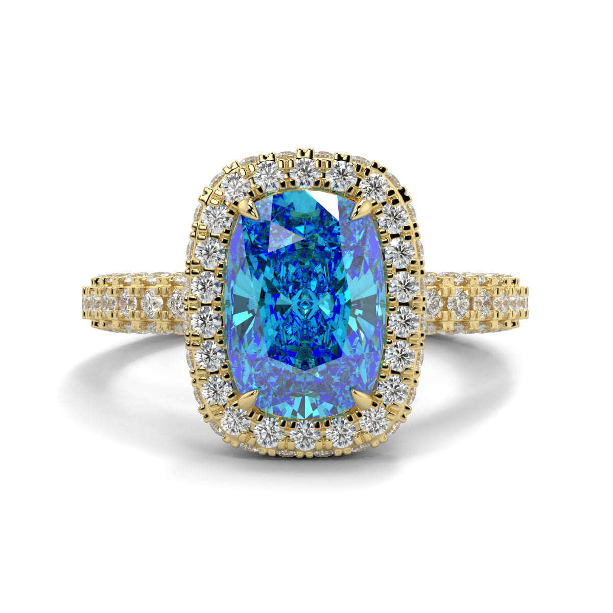 Ring with a blue gemstone and gold setting on a white background yb jewellers cushion blue diamond engagement ring in a halo diamond ring lab grown with diamond encrusted hidden halo and band