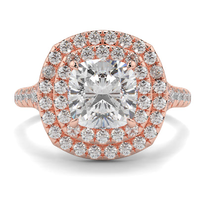 Rose gold ring with a large diamond and smaller diamonds around on a white background Yb jewellers trending design double halo ring