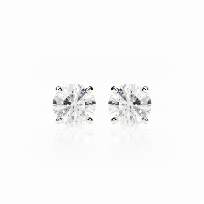 Pair of diamond stud earrings on a white background yb jewellers screw back earrings best selling design 