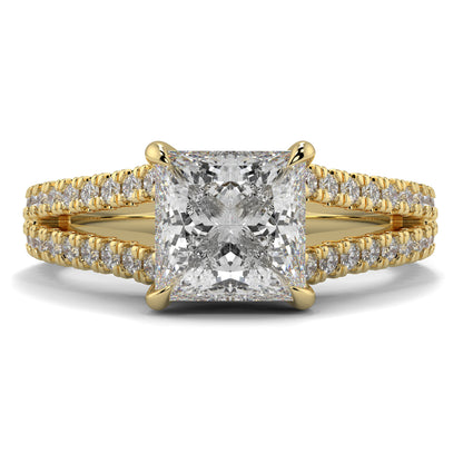 Gold ring with a large diamond and smaller diamonds on the band against a white background Yb jewellers engagement ring straight band