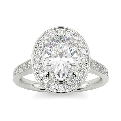 Diamond ring with a central gemstone and smaller diamonds on a white  oval halo best sling design Yb Jewellers  background