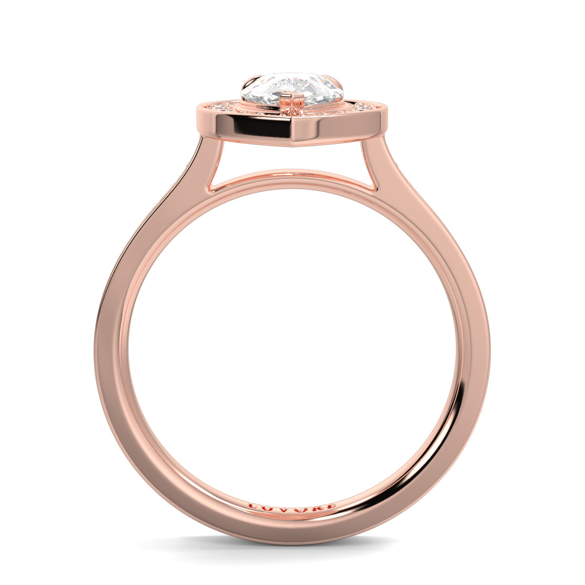 Rose gold ring with a diamond on a white background Pear shaped diamond engagement ring Yb jewellers trending ring designs
