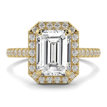 Gold ring with a large central diamond and smaller diamonds around on a white background YB_Jewellers_Engagement_Ring
