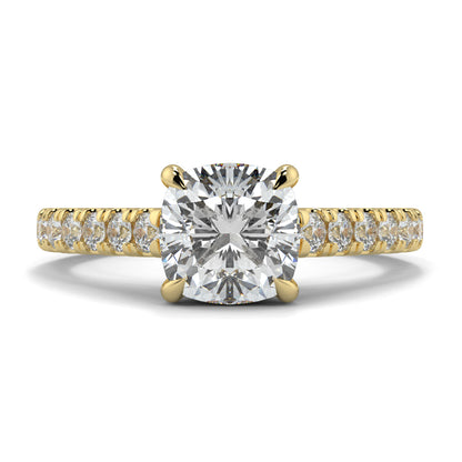 Gold ring with a large diamond and smaller diamonds on the band against a white background Yb jewellers engagement ring straight band