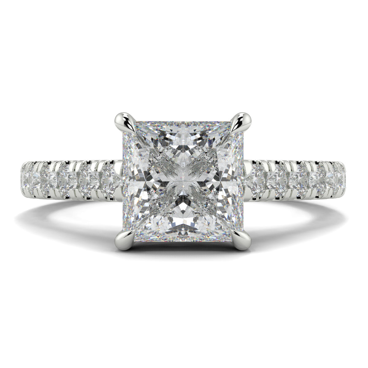 Diamond ring with a prominent central gemstone and smaller stones on the band against a white background Yb jewellers engagement ring straight band