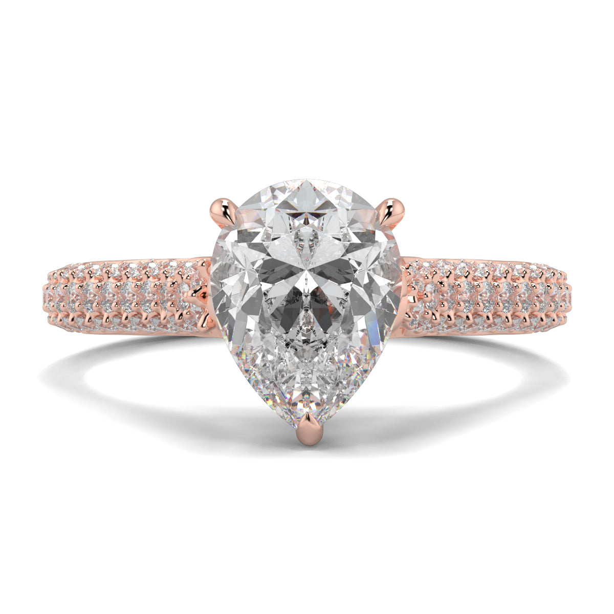 Rose gold ring with a pear-shaped diamond on a white background Yb jewellers engagement ring straight band
