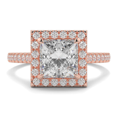 Rose gold ring with a large diamond and smaller diamonds on the band against a white background yb jewellers engagement ring princess cut diamond ring tiger claws