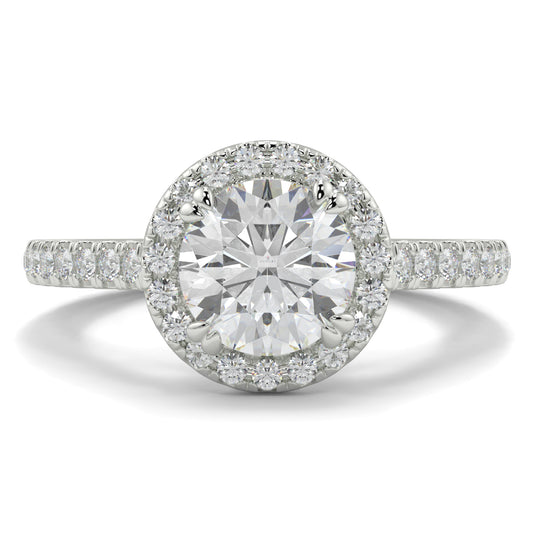 Diamond ring with a clear gemstone on a white background round diamond halo engagement ring yb jewellers tiger claws vintage style