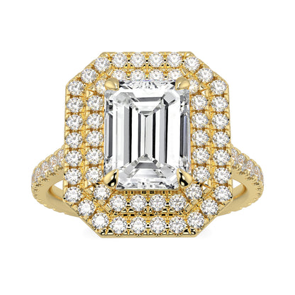 Gold ring with emerald-cut center stone and diamond halo on a white  yb jewellers best selling ring designs emerald diamond double halobackground