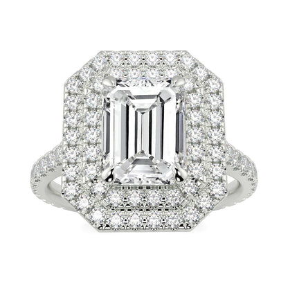 Diamond ring with emerald-cut center stone and halo on a white background yb jewellers best selling ring designs emerald diamond double halo