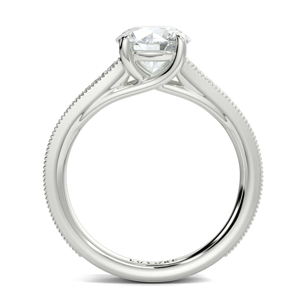 Silver ring with a diamond on a white background yub jewellers platinum side view engagement ring