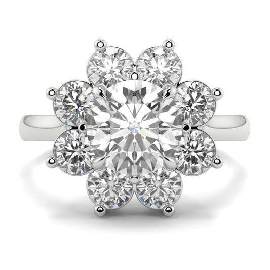 Diamond ring with multiple gemstones on a white background yb jewellers cluster halo ring engagement ring grain set halo round shape plain band