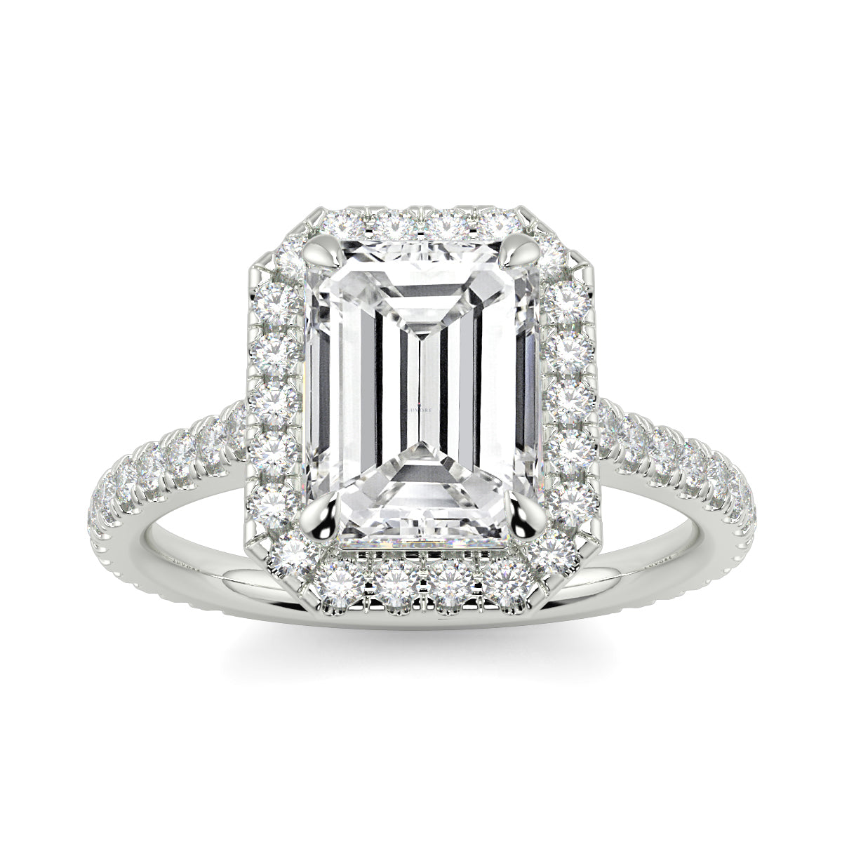 Diamond ring with emerald-cut center stone on a white background YB_Jewellers_Engagement_Ring 