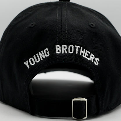 Black cap with 'YOUNG BROTHERS' embroidery on a gray background