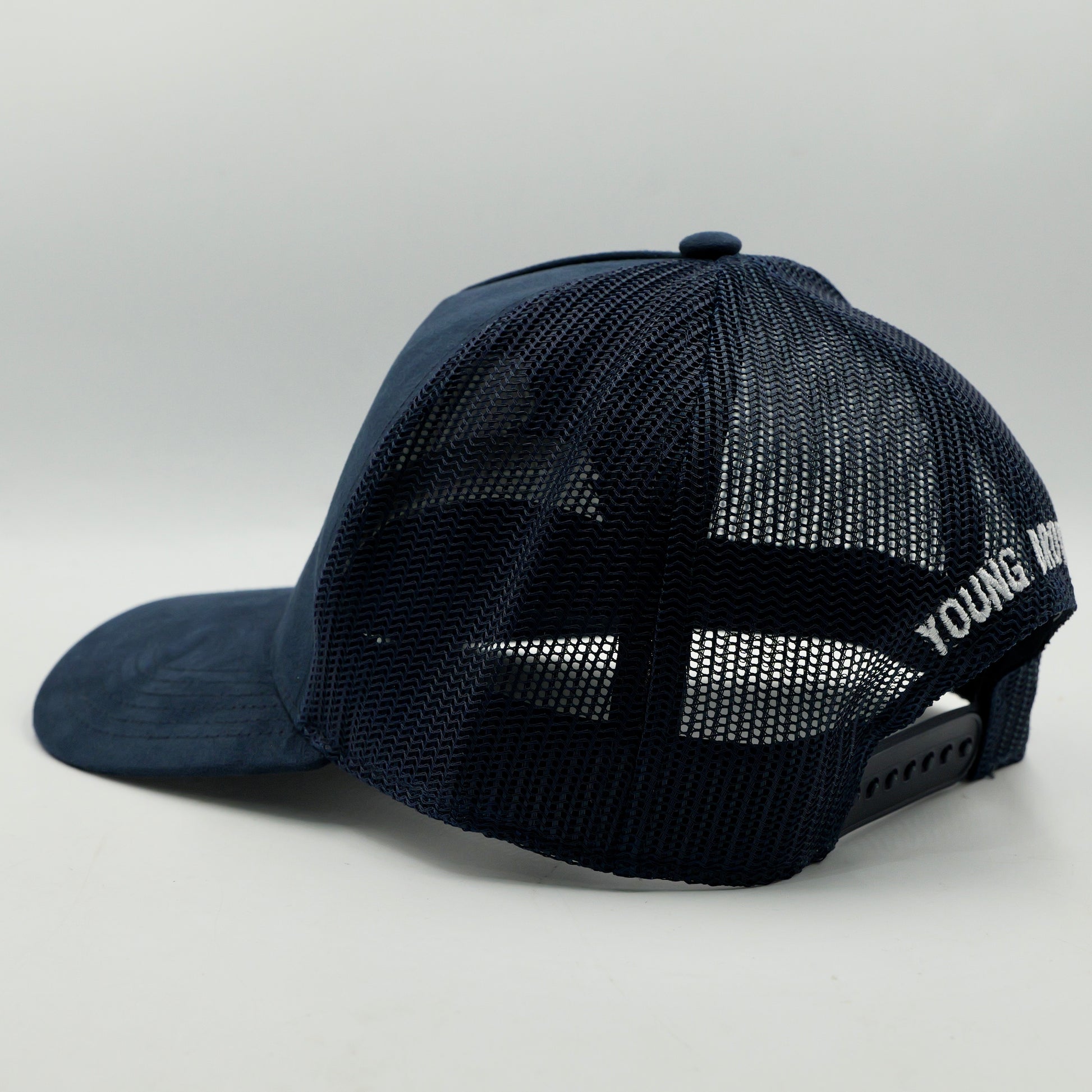 Black mesh cap with 'Young' branding on a light gray background