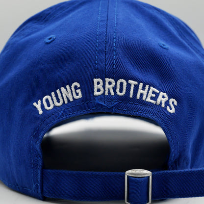 Blue cap with 'YOUNG BROTHERS' embroidery on a gray background