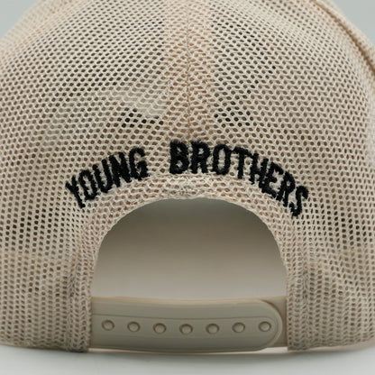 Beige mesh cap with 'YOUNG BROTHERS' text on a light gray background