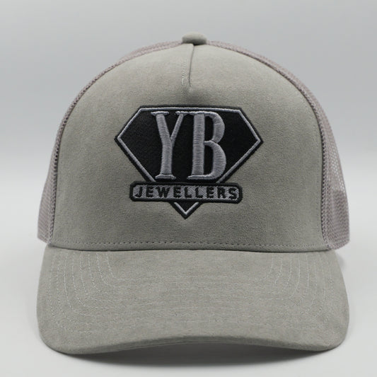 Gray cap with YB Jewellers logo on a light gray background