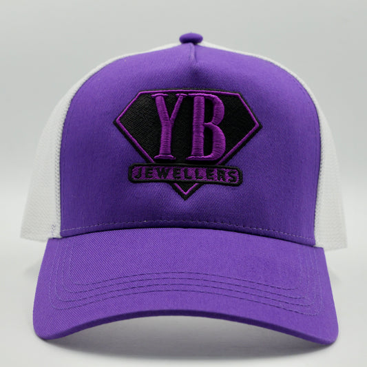 Purple and white cap with 'YB' logo on a gray background