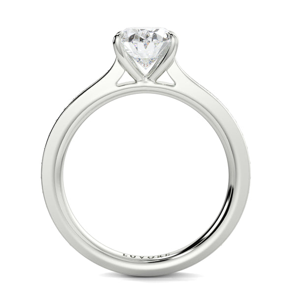 Silver ring with a heart-shaped diamond on a white background Yb jewellers engagement ring straight band