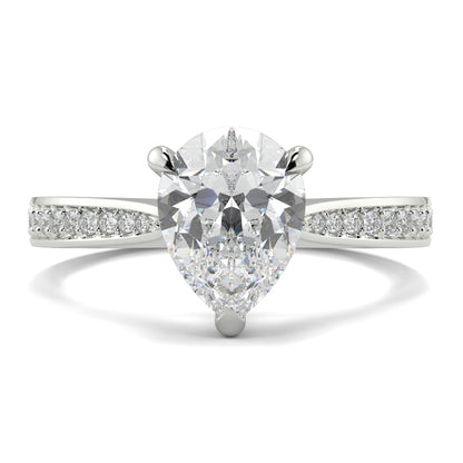 Diamond ring with pear-shaped center stone on a white background Yb jewellers engagement ring straight band