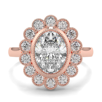 Rose gold ring with a large central diamond and smaller diamonds around on a white background yb jewellers cluster halo ring engagement ring grain set halo oval shape plain band