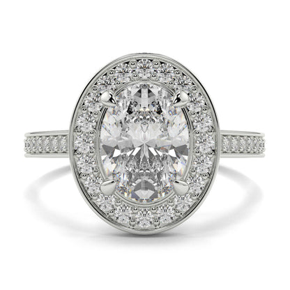 Diamond ring with a halo of smaller diamonds on a white background oval halo best sling design Yb Jewellers 