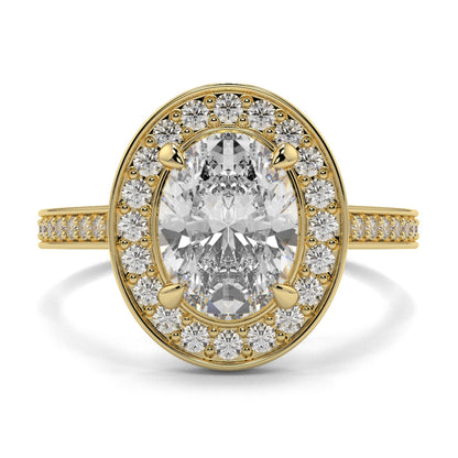 Gold ring with a large central diamond and smaller diamonds around on a white background oval halo best sling design Yb Jewellers 