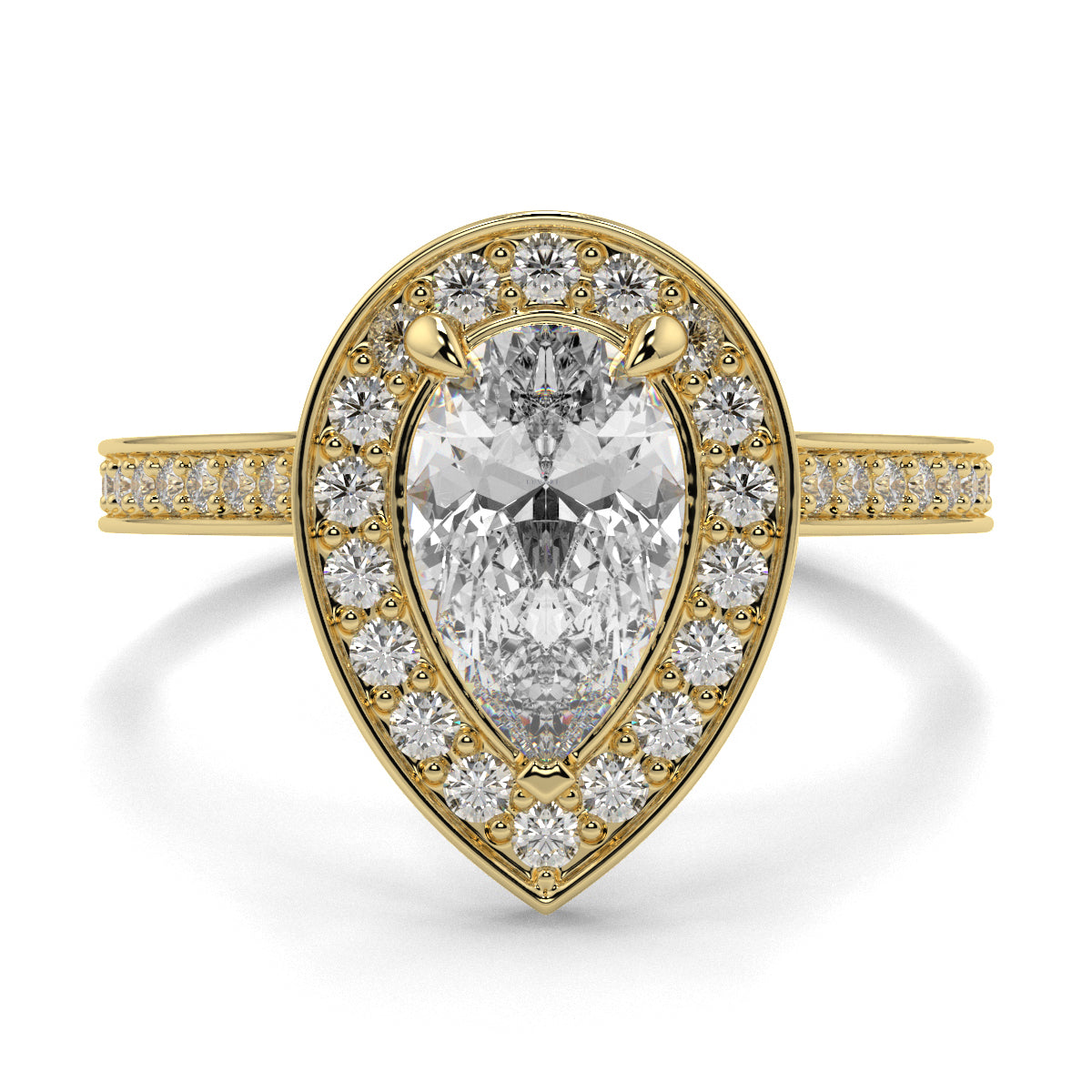 Gold ring with a pear-shaped diamond and smaller diamonds on a white background Pear shaped diamond engagement ring Yb jewellers trending ring designs