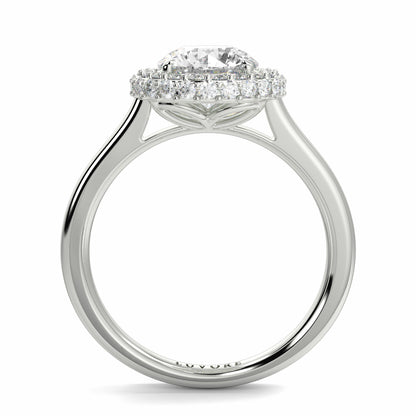 Diamond ring with a halo setting on a white background yb jewellers round diamond halo ring with plain shoulders trending bestseller design 