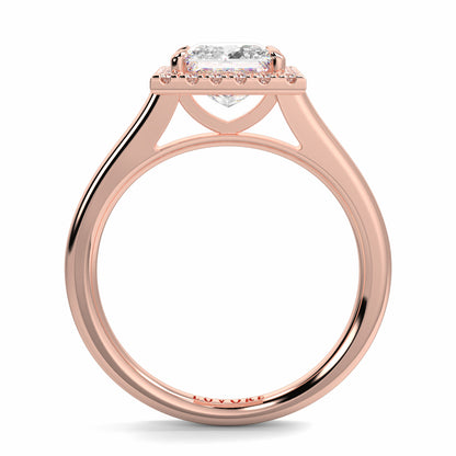 Rose gold ring with a diamond on a white background Yb jewellers princess cut diamond halo plain shoulders 
