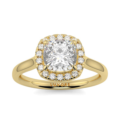 Gold ring with a large diamond and smaller diamonds around on a white background single halo with plain shoulder diamond engagement ring yb jewellers best seller trending ring 