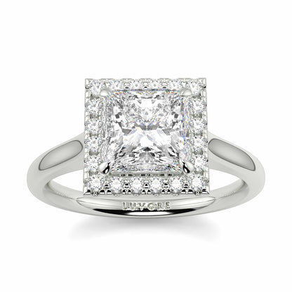 Diamond ring with 'July One' branding on a white background Yb jewellers princess cut diamond halo plain shoulders 