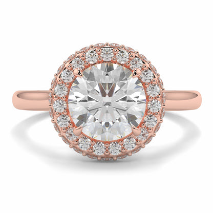 Rose gold ring with a large diamond and smaller diamonds around on a white background yb jewellers round diamond halo ring with plain shoulders trending bestseller design
