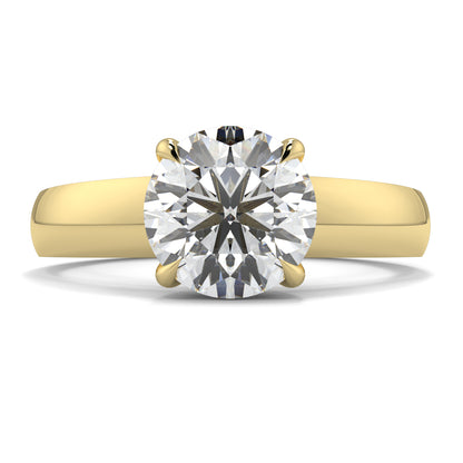 Gold ring with a large diamond on a white background yb jewellers solitaire engagement ring 4 claw diamond centre lab grown diamond round brilliant best selling engagement ring